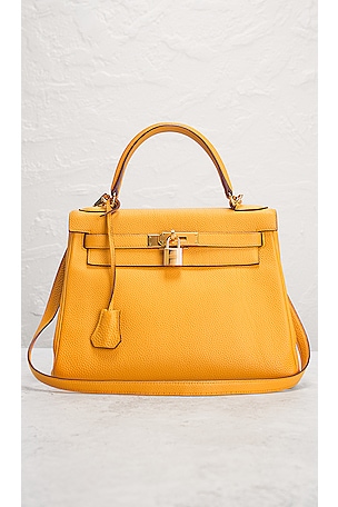 FWRD Renew Hermes Togo Kelly 28 Handbag in Mustard