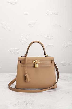 Fwrd renew bolso hermes en color Beige