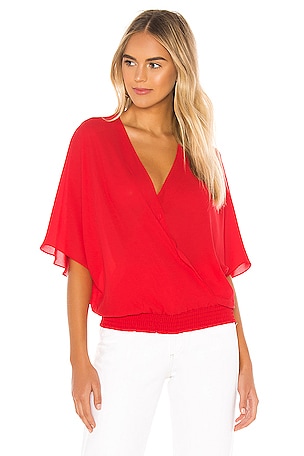 krisa Smocked Waist Surplice Top in Starlet REVOLVE