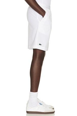 Lacoste Shorts in White. Size 7. Also