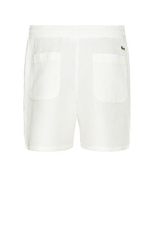 Lacoste Waffle Monochrome Elasticated Textured Shorts in Cream. Size 6. Also