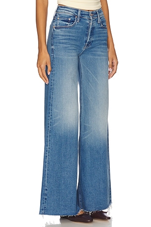 MOTHER The Tomcat Swisher Sneak Fray Jeans in Blue