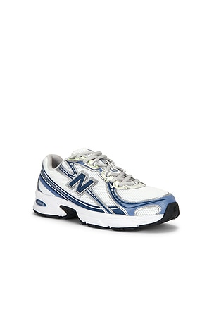 New Balance U7405K9 in White