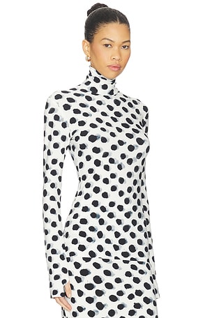 Norma Kamali Slim Fit Long Sleeve Turtleneck Top in Black,White