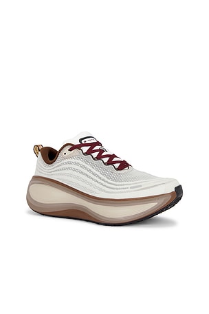 Nike Vomero Plus in Cream