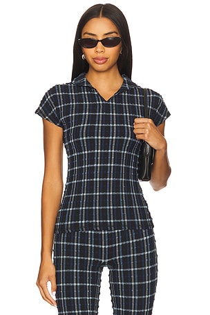 The Cindy Polo Top Peachy Den