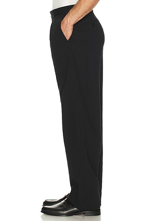 Palmes Wide Pleated Suit Trousers in Black. Size 52. Also