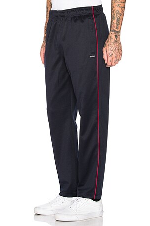 Stussy Poly Track Pant in Navy | REVOLVE