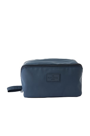 The Toiletry Carry Flat Lay London