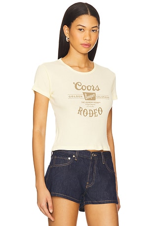 The Laundry Room Coors Banquet Rodeo Stamp Baby Tee in Yellow
