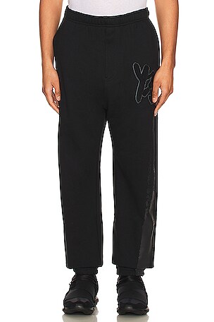 Y-3 Yohji Yamamoto Graphic Logo Ft Pant in Black | REVOLVE