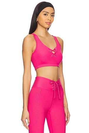 YEAR OF OURS Ribbed Football Bra in Pink. Size XS. Also