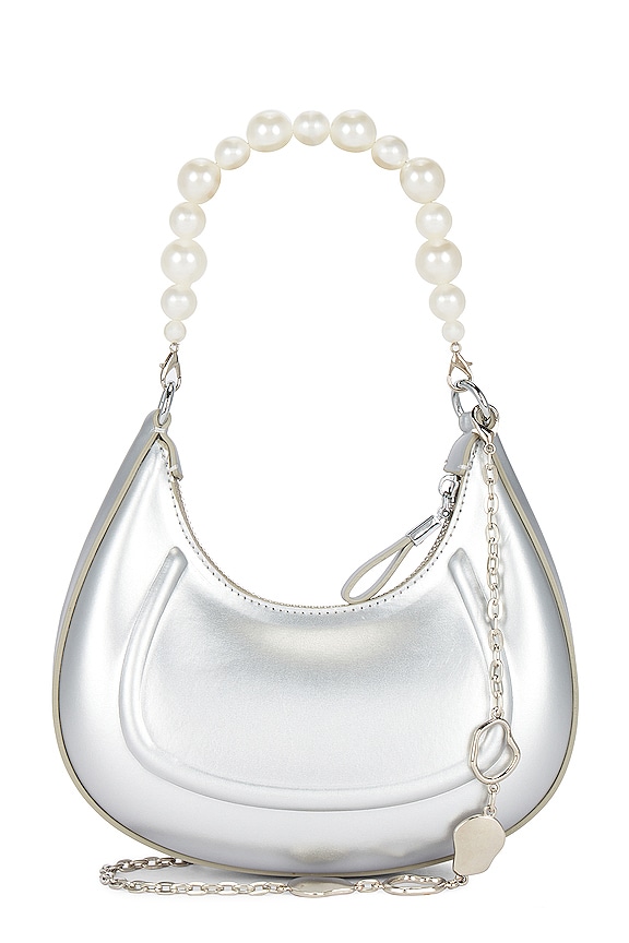 Silver handbag with pearl style shoulder strap