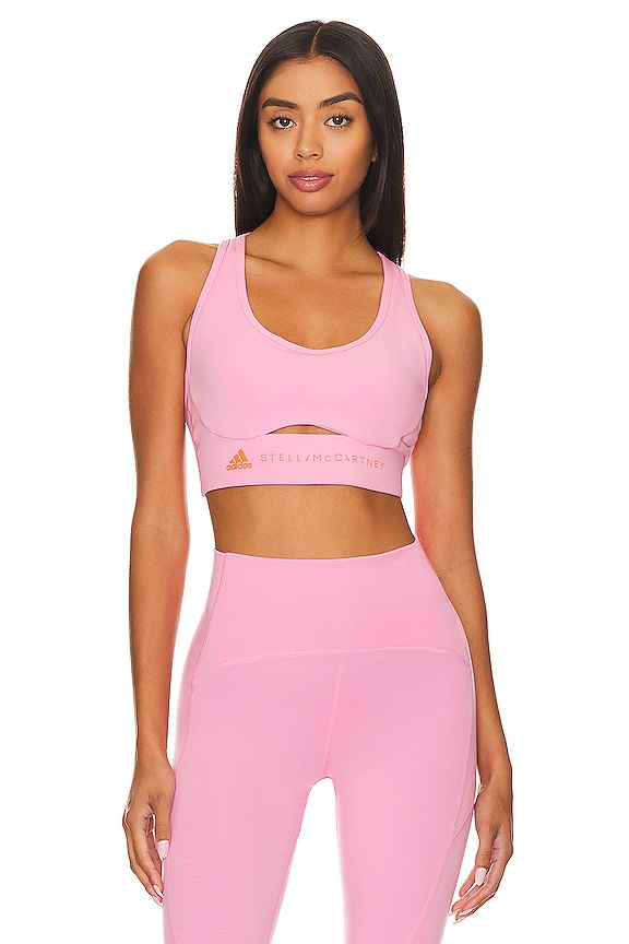 view 1 of 4 True Strength Medium Support Bra in Semi Pink Glow