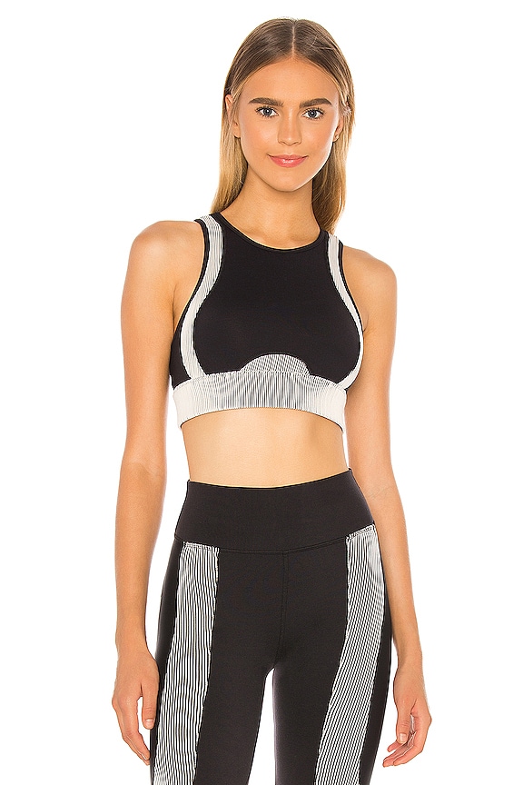 alo Electric Sports Bra in Black | REVOLVE