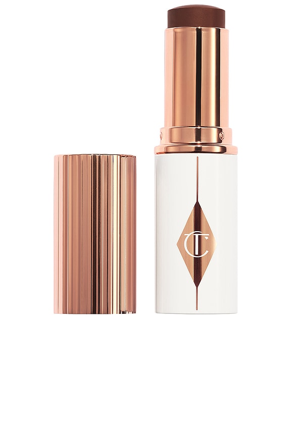 view 1 of 7 Unreal Skin Sheer Glow Tint Hydrating Foundation Stick in 16 Deep