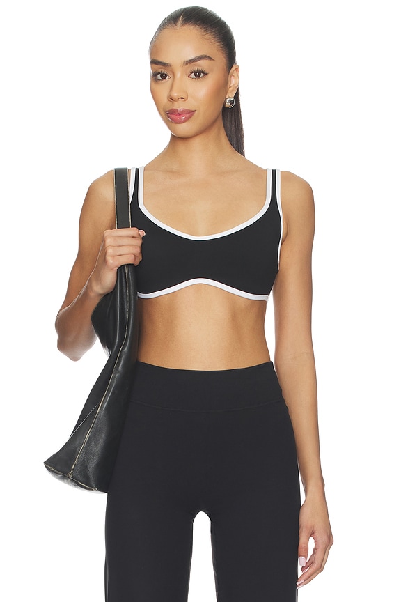 view 1 of 4 SUJETADOR DEPORTIVO CON DOBLADILLO CURVO CURVED HEM SPORTS BRA in Black