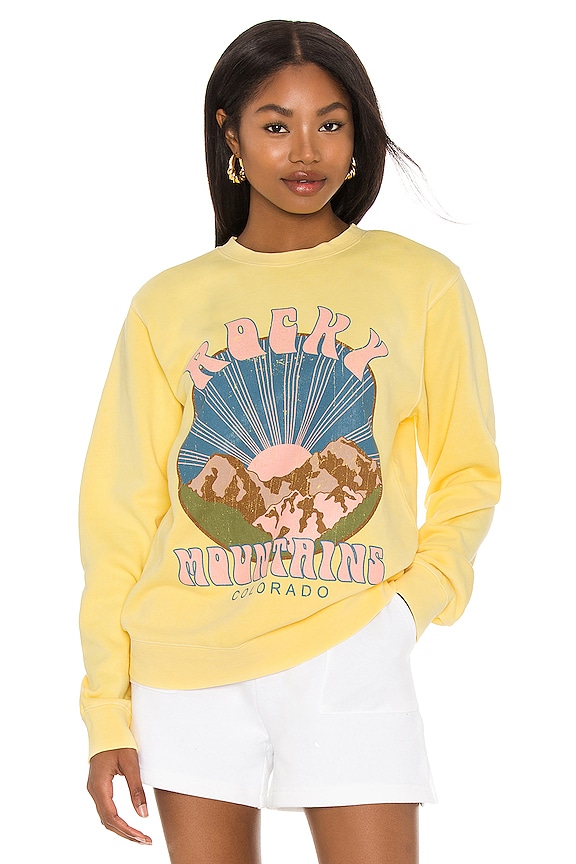 Girl Dangerous Rocky Mountains Sweatshirt in Vintage Yellow | REVOLVE