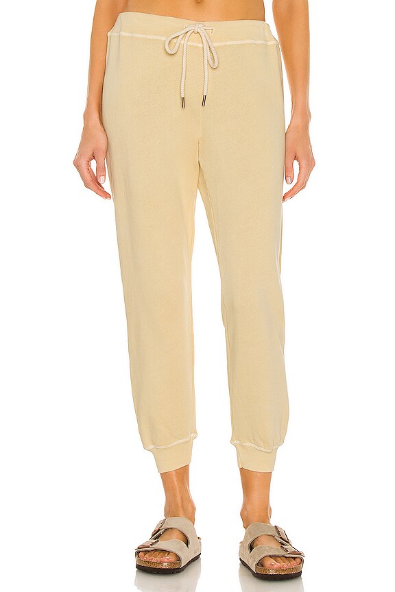 The Great The Cropped Sweatpant in Light Lemon | REVOLVE