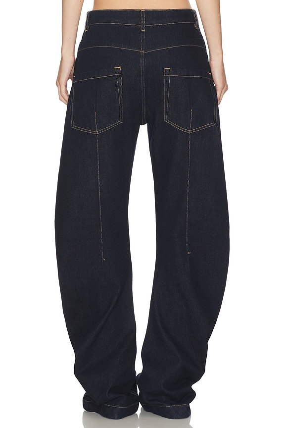 HAELO Banana Twist Flare Jean in Indigo | REVOLVE