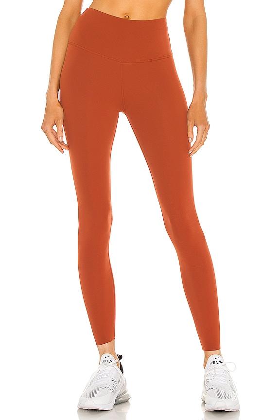 Nike Yoga Luxe 7/8 Tight in Rugged Orange | REVOLVE