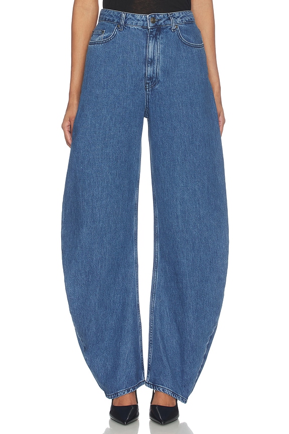 view 1 of 6 JEANS CON PERNERA ACAMPANADA DRAPED BARREL LEG JEANS in Medium Blue Denim