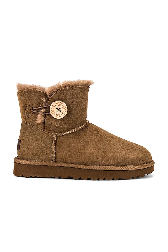 UGG Mini Bailey Button II Shearling Bootie in Hickory | REVOLVE