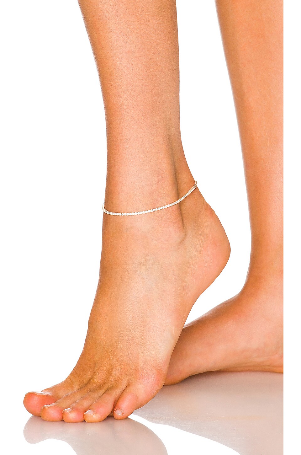 adina-s-jewels-tennis-anklet-in-gold-revolve