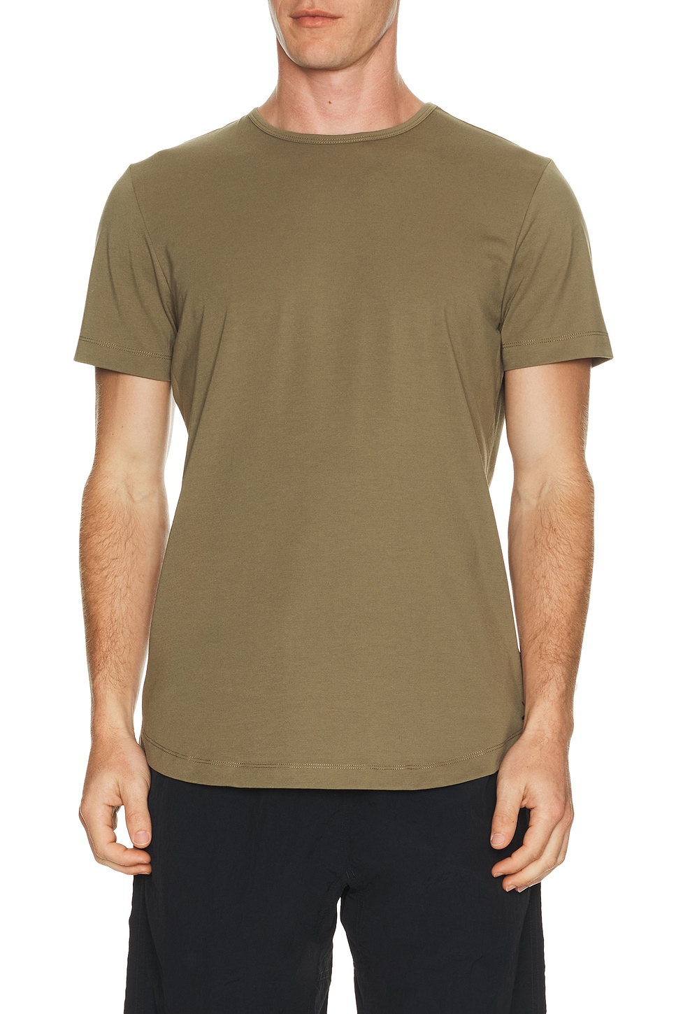 Cuts Curve Hem Tee in Capers | REVOLVE