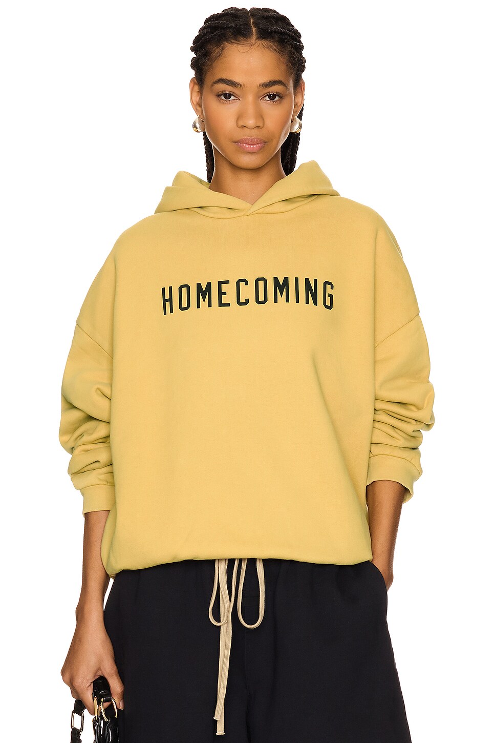 Fear of God ESSENTIALS Heavy Fleece Hoodie in Amber | REVOLVE 