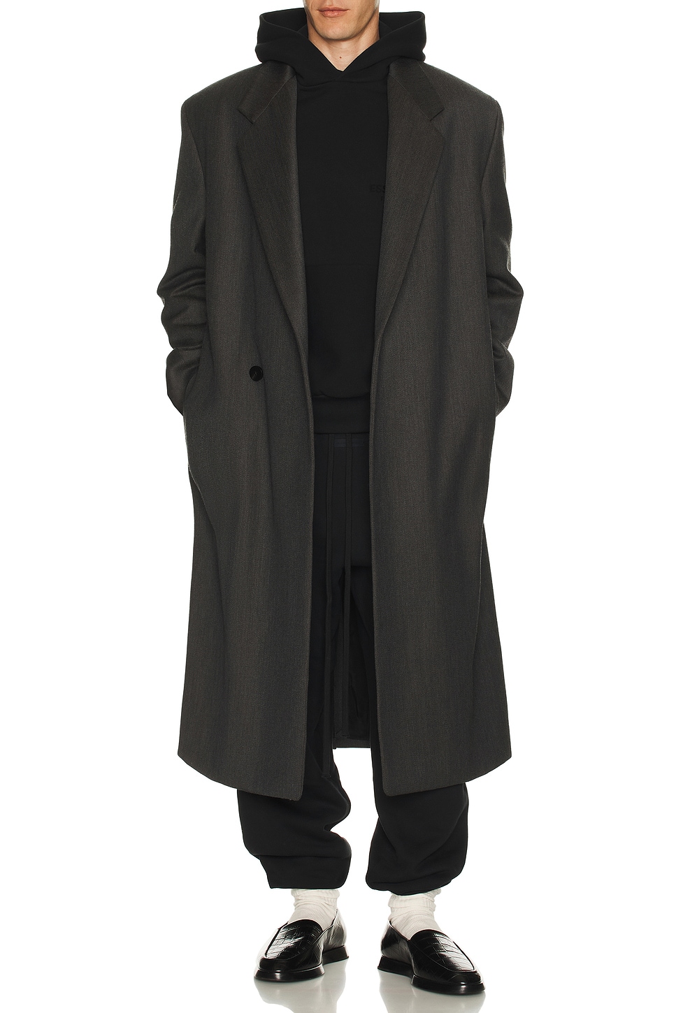 Fear of God ESSENTIALS Classic Hoodie in Vintage Black | REVOLVE