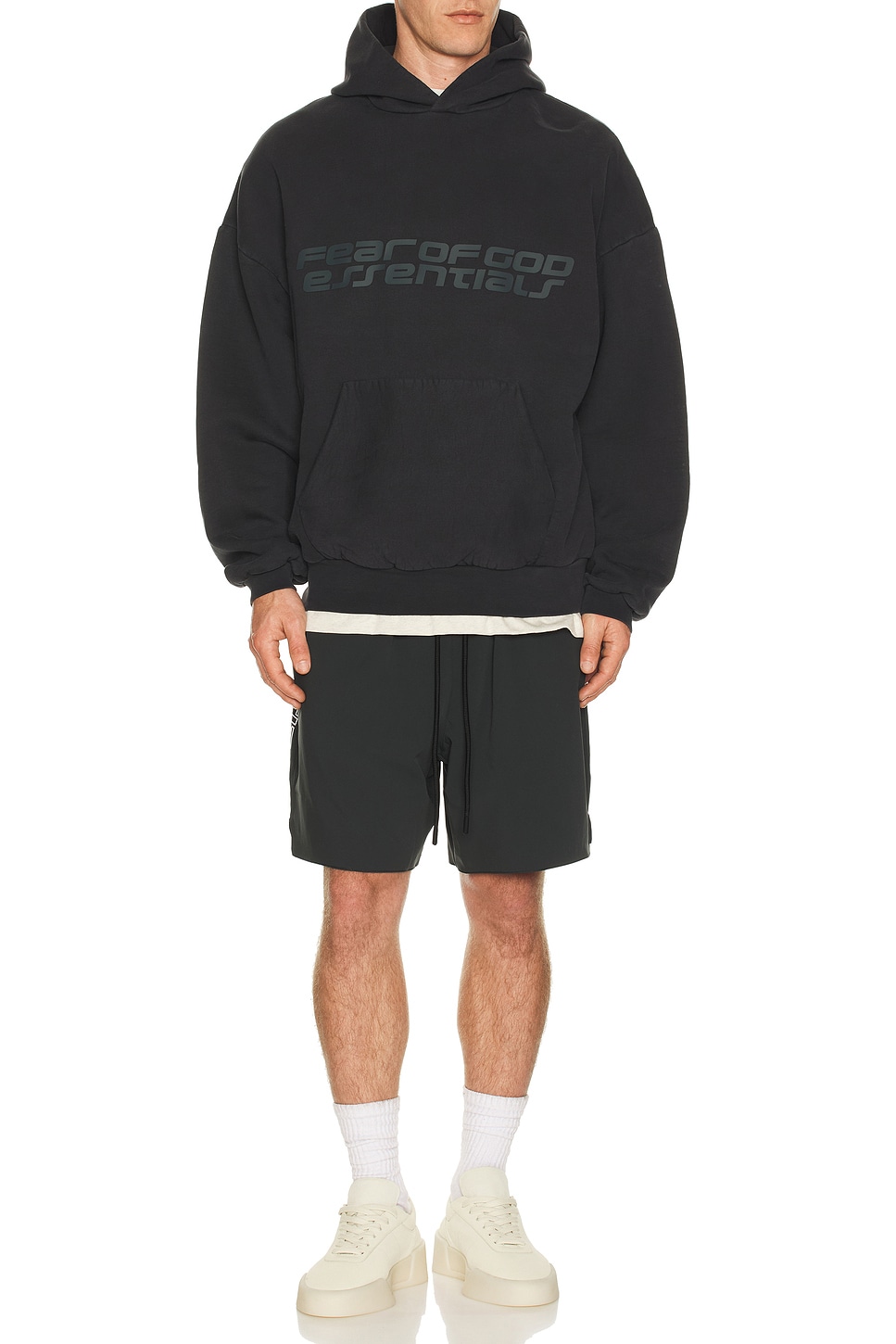 Fear of God ESSENTIALS 90'S Hoodie in Vintage Black | REVOLVE