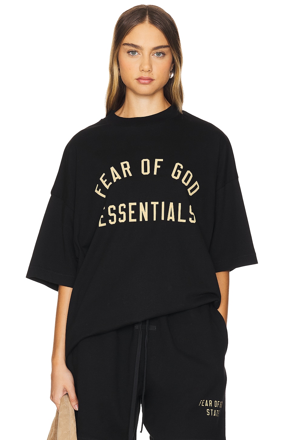 Fear of God ESSENTIALS Jersey Crewneck Tee in Black | REVOLVE