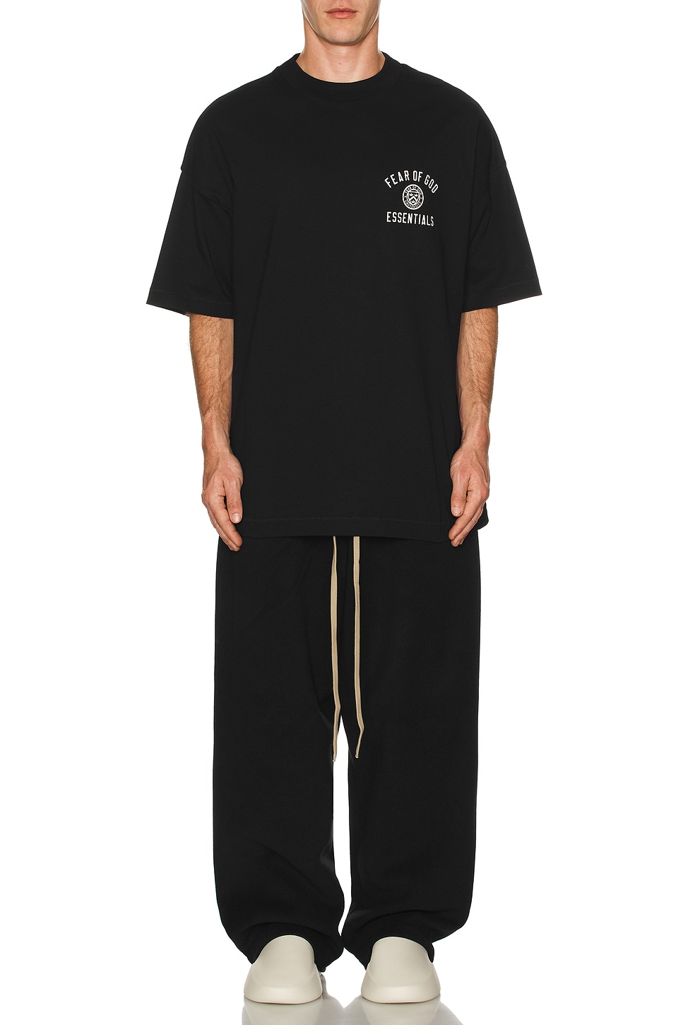 Fear of God ESSENTIALS Jersey Crewneck Tee in Black | REVOLVE