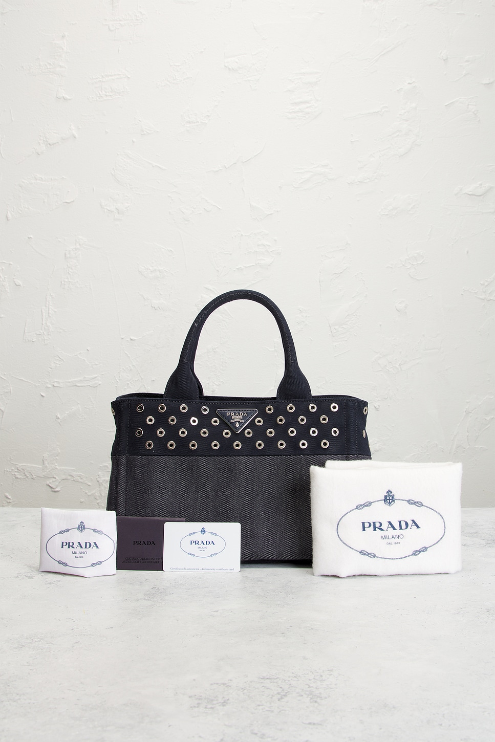 プラダ カナパ FWRD Renew Prada Studded Denim Canapa Tote Bag in Blue | REVOLVE