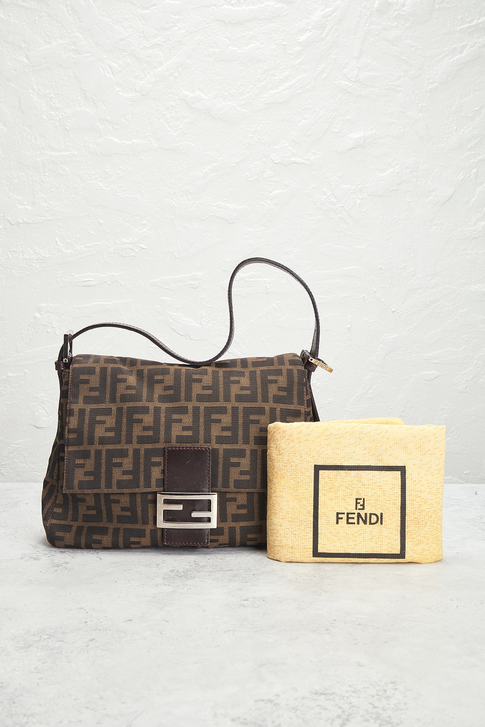 fendi zucca shoulder bag tobacco The signature Large is designed as a spacious, easy everyday carryall. Roomy yet refined, it holds all your essentials while seamlessly complementing any outfit., This Zucca shoulder bag features a canvas body FENDI Zucca Patent Leather Large