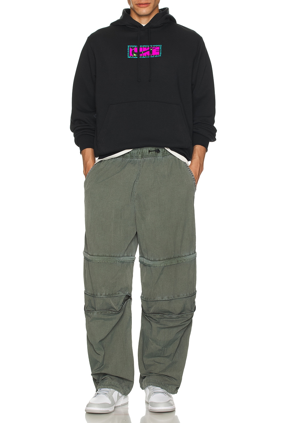 Nike Tech Woven Washed Pants in Sequoia & Black | REVOLVE