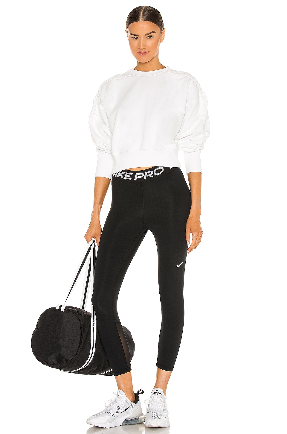 Shop Nike Np 365 Tight Crop In Black & White