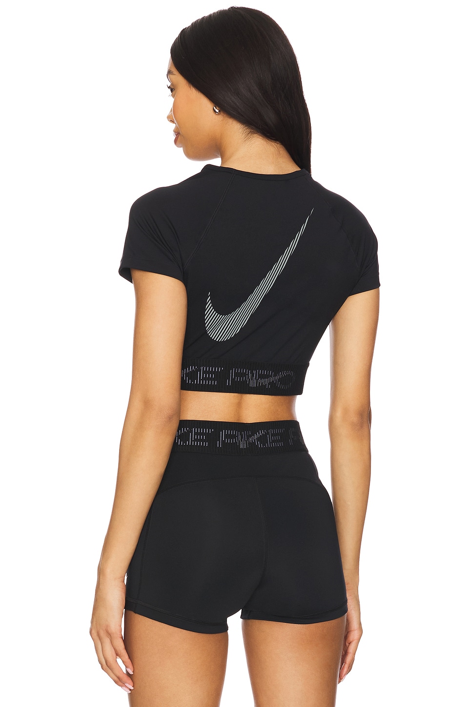Nike Dri-FIT Cropped Graphic Short Sleeve Top in Black, Cool