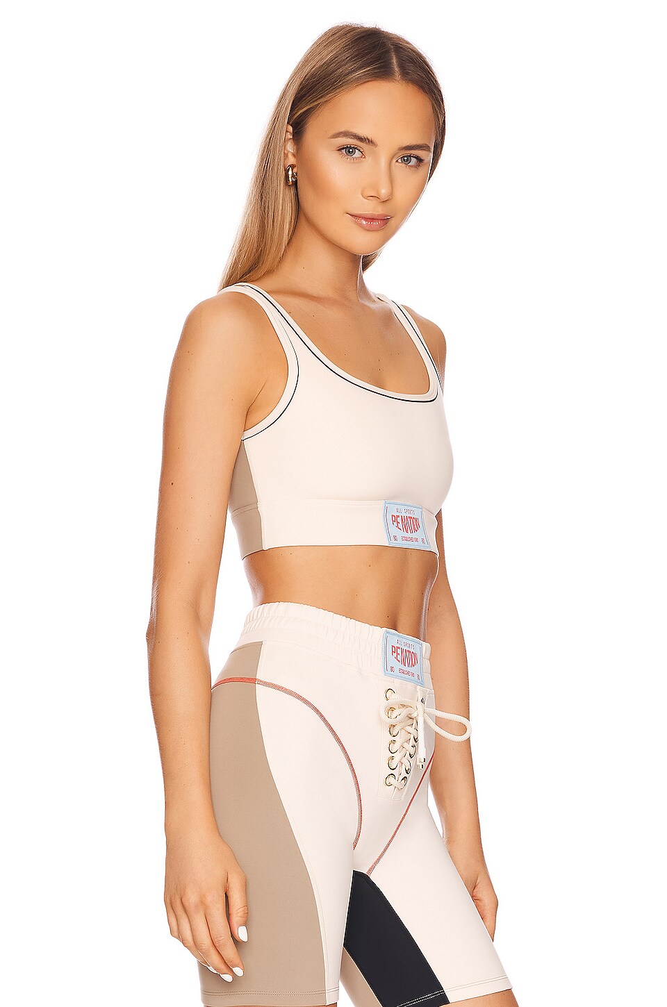 P.E Nation Undefeated Sports Bra in Pearled Ivory