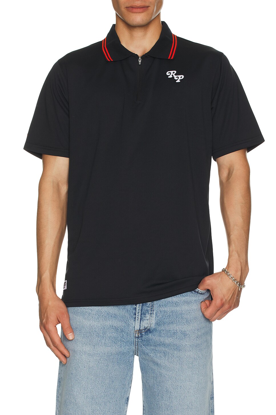 Rivvia Projects Scholar Polo in Black | REVOLVE