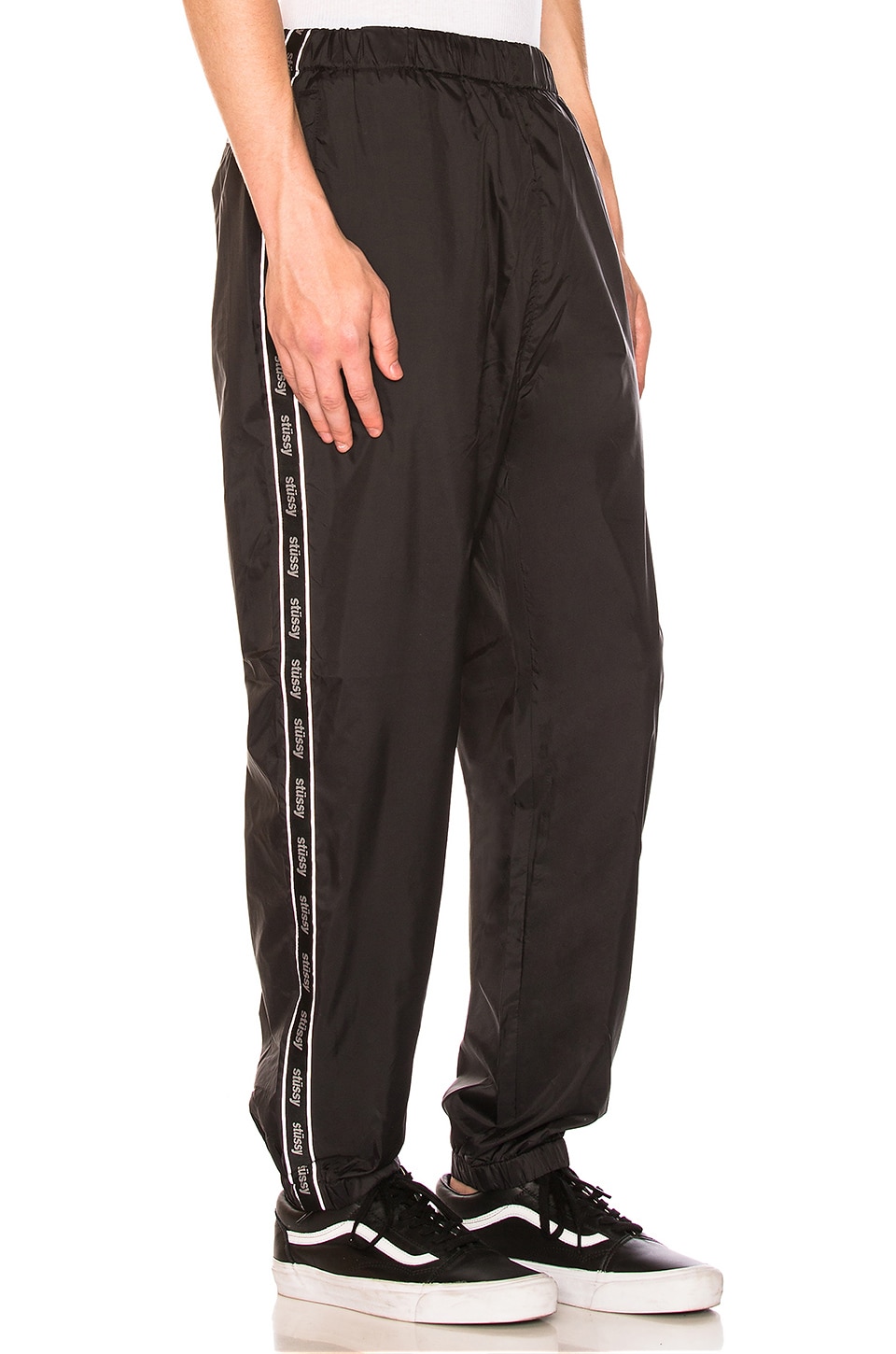 Stussy Nylon Warm Up Pant in Black REVOLVE