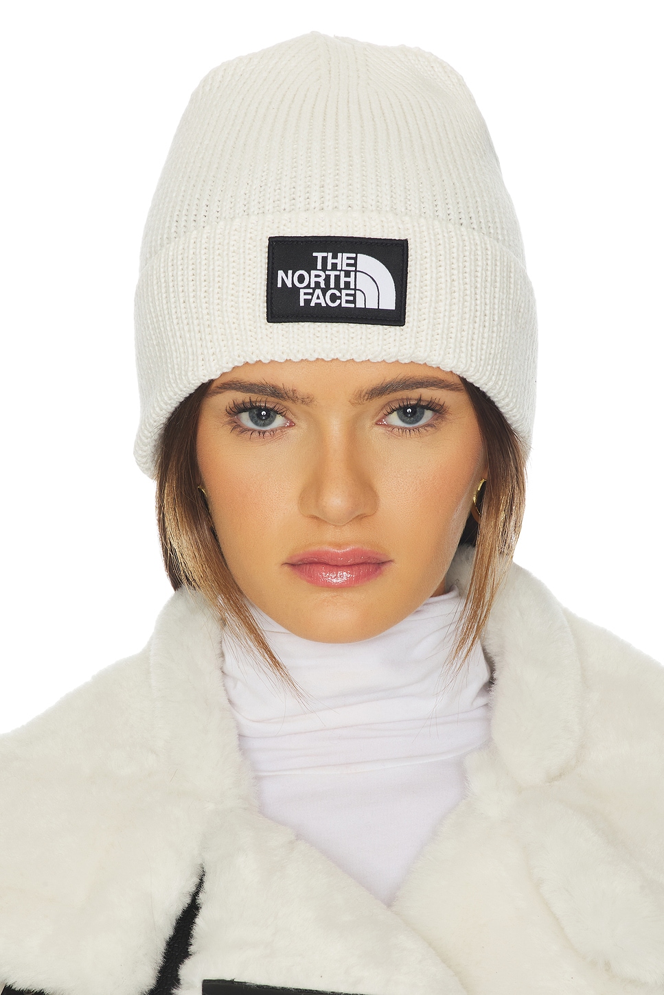 The North Face Logo Box Cuffed Beanie in White Dune | REVOLVE display picture 1