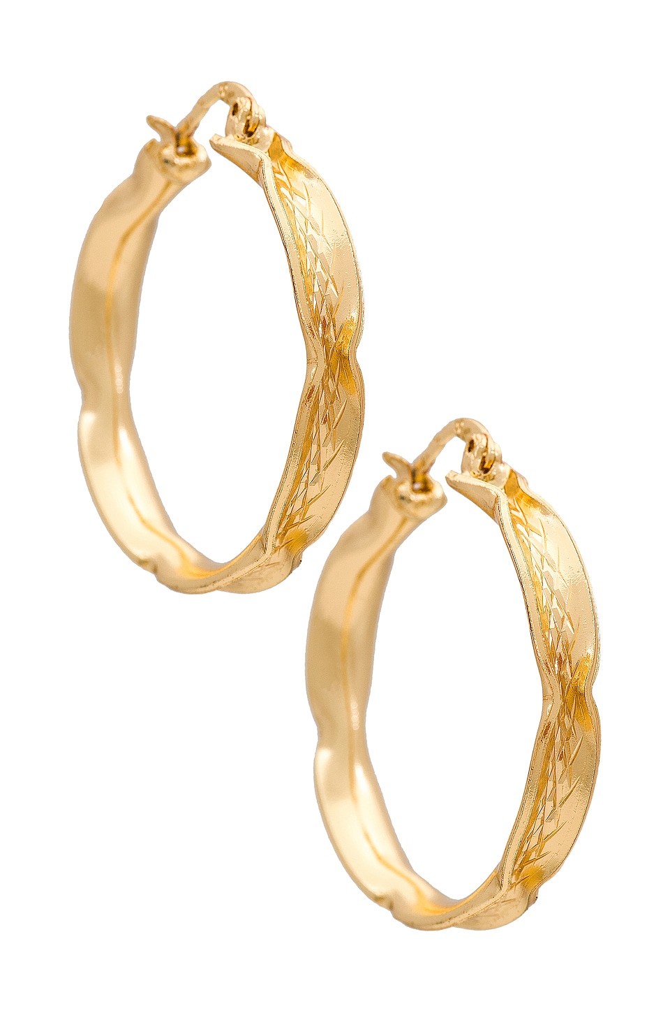 The M Jewelers NY Twisted Segnata Hoops in Gold | REVOLVE