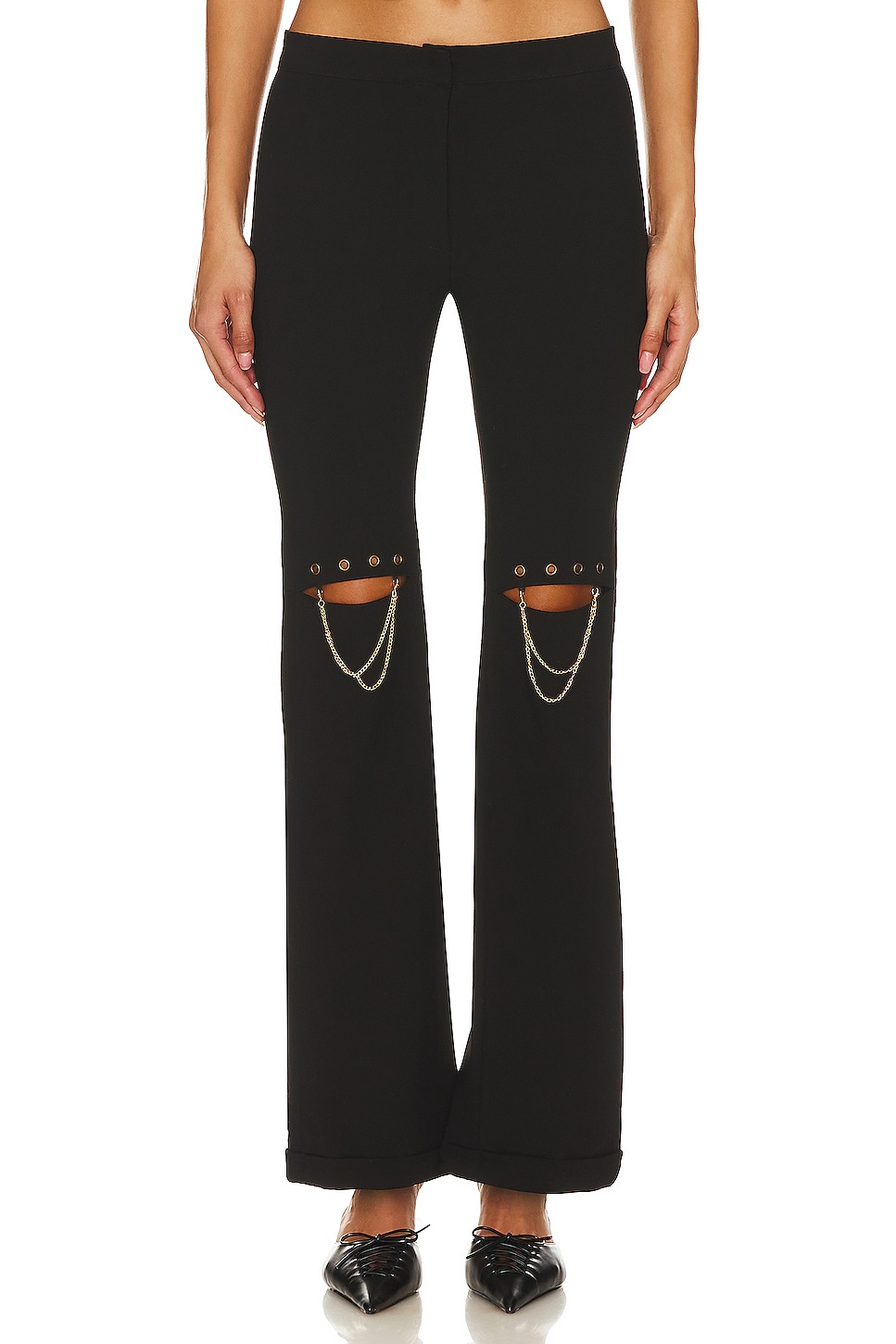 Black pants store with knee slits