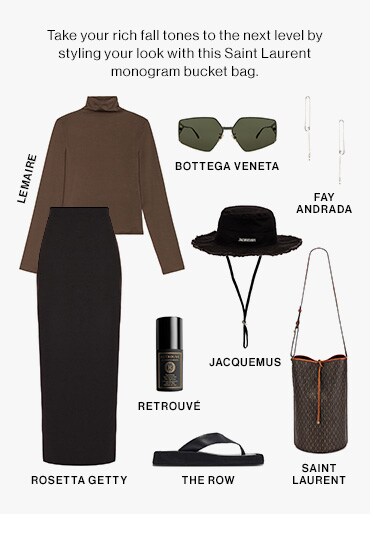 Take your rich fall tones to the next level by styling your look with this Saint Laurent monogram bucket bag.