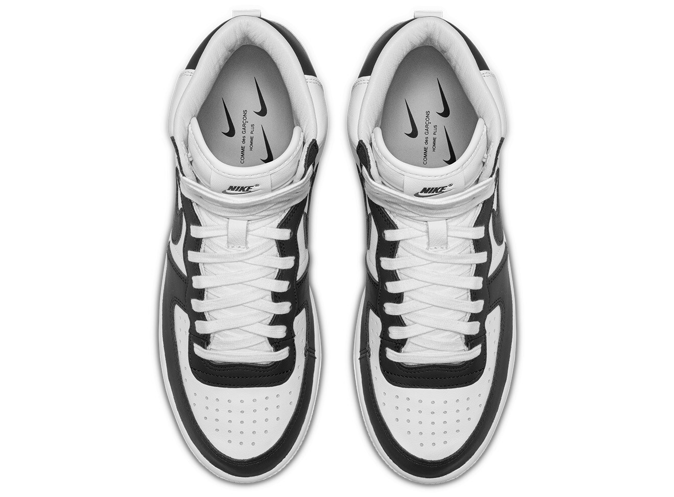 A top view close up of Comme des Garcons Homme x Nike shoes.