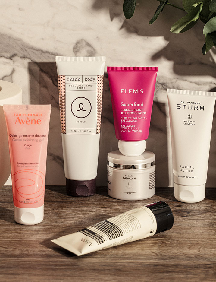 A close up of a variety of facial skincare products.