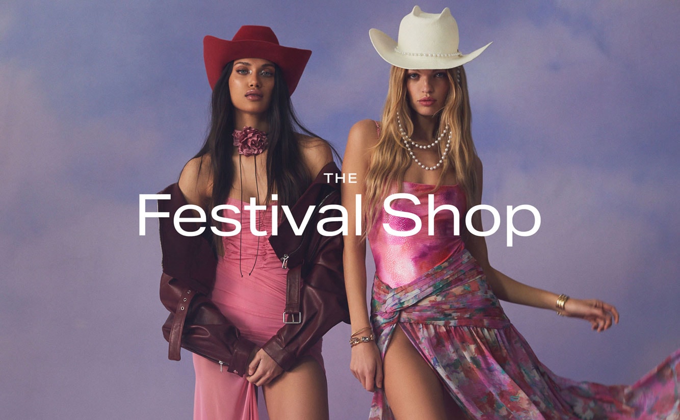 Two models in red and pink shades of festival styled looks topped with western inspired hats. The Festival Shop