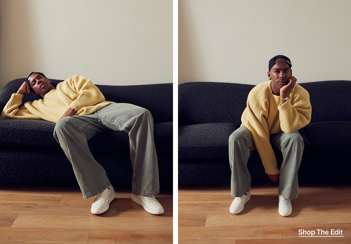 Jason Bolden sitting on a dark violet couch in a lemon cream Fear Of God sweater and denim jeans.